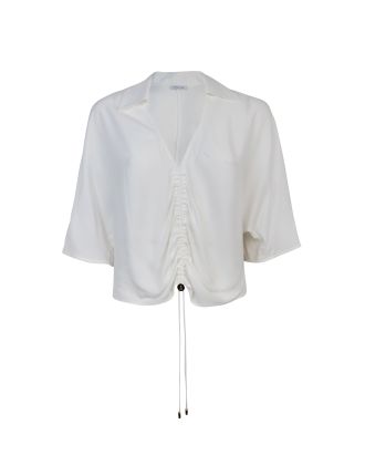 Blusa bianca con arricciatura
