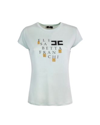 T-shirt celeste con logo e applicazioni